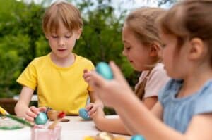 kids with painted eggs close up 23 2149027432