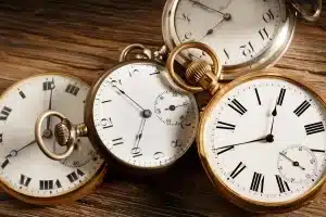 depositphotos 213209598 stock photo vintage pocket watches aged wood