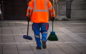 man cleaning street e1718268151368