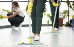 person cleaning the floor e1720526326460