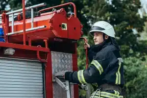 depositphotos 221908444 stock photo male firefighter protective helmet standing