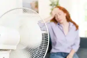 depositphotos 485225864 stock photo one woman suffers heat summer 1