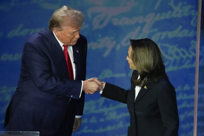 Republican presidential nominee former President Donald Trump and Democratic presidential nominee Vice President Kamala Harris shake hands before the start of an ABC News presidential debate at the National Constitution Center, Tuesday, Sept. 10, 2024, in Philadelphia. (AP Photo/Alex Brandon)